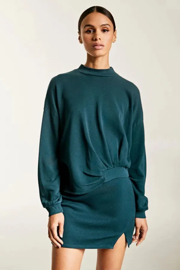 Asymmetrical Hem Turtleneck